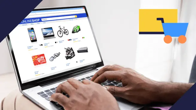 Pessoa usando um laptop, navegando em um site de compras online que exibe diversos produtos, como celulares, bicicletas e câmeras. Um ícone de carrinho de compras com uma caixa amarela aparece no canto superior direito.